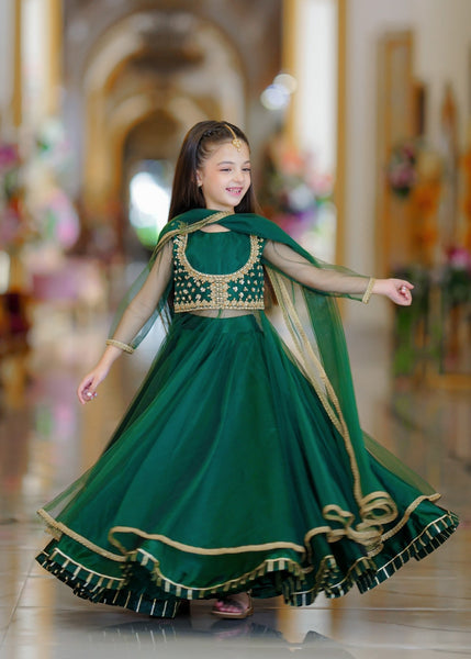 Seerat HEER girls bottle green net maxi and silk lehenga set
Detailed hand-crafted Adda work on Seerat HEER bottle green maxi
Full silhouette of Seerat HEER multi-layered bottle green lehenga
