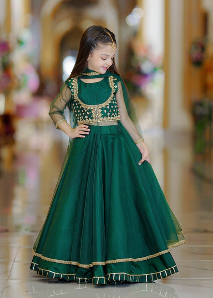 Seerat HEER girls bottle green net maxi and silk lehenga set
Detailed hand-crafted Adda work on Seerat HEER bottle green maxi
Full silhouette of Seerat HEER multi-layered bottle green lehenga