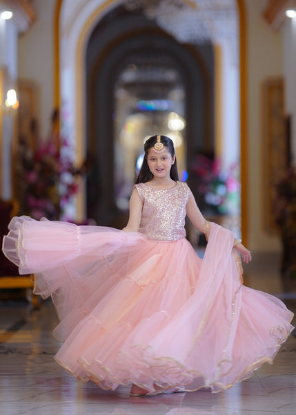 Seerat LAADLI girls dark green zari cotton lehenga choli - Full View
Detailed cut-work on Seerat LAADLI zari cotton choli
Voluminous multi-layered net lehenga in dark green by Seerat