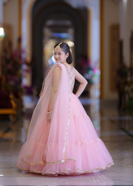 Seerat LAADLI girls dark green zari cotton lehenga choli - Full View
Detailed cut-work on Seerat LAADLI zari cotton choli
Voluminous multi-layered net lehenga in dark green by Seerat